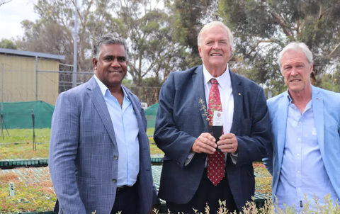 NLE Chairperson Oral McGuire standing next to WA Governor Kim Beasley and NLE CEO Alan Beattie at a tree nursery